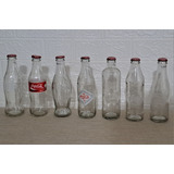7 Garrafas Vazias De Coca-cola -